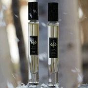 Raw Spirit Fragrances Fresh Rollerball perfume set features Eau de Parfum rollerballs of the fresh, citrus scents Summer Rain and Bijou Vert.