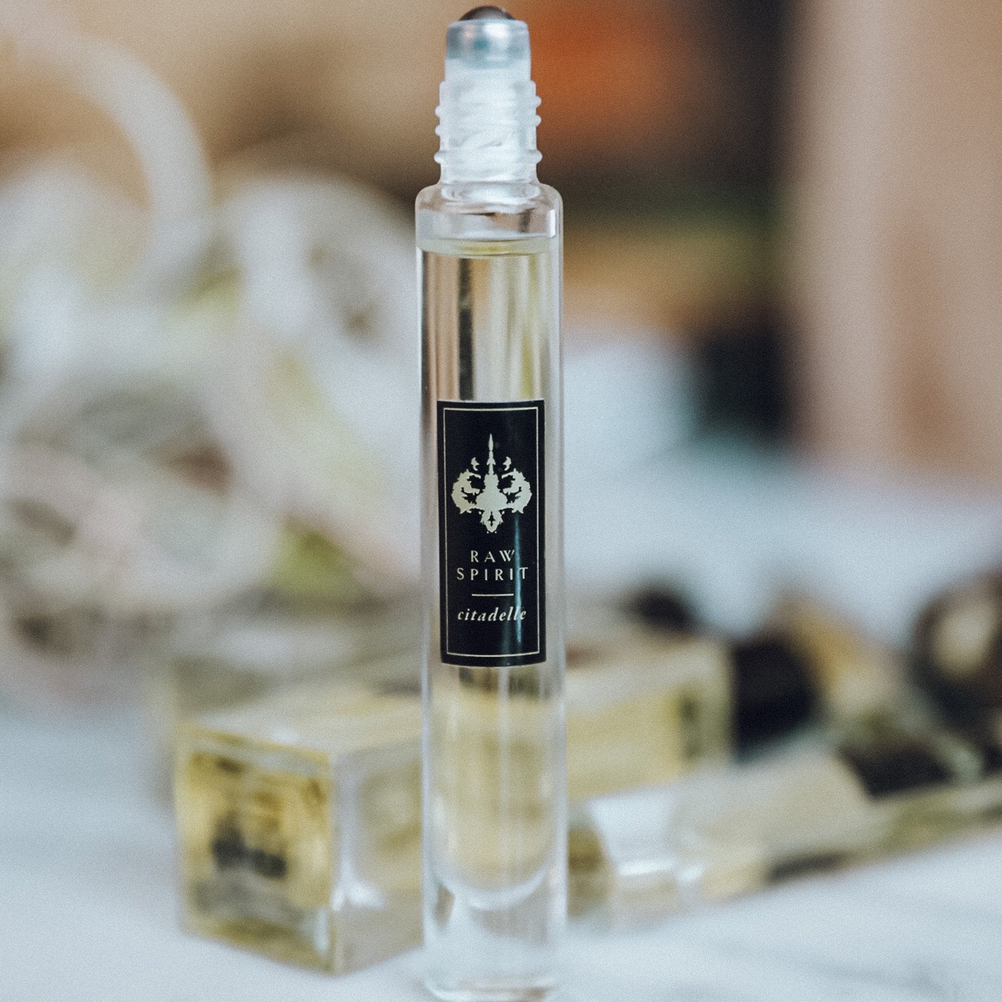 Raw Spirit Citadelle unisex perfume is a fresh, clean, modern interpretation of a classic vetiver fragrance, blending premium Haitian vetiver, marigold, pear, bergamot, lemon, cinnamon, nutmeg, amberwood, musk and cedarwood.