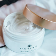 Raw Spirit Mystic Pearl Scented Body Butter is a rich floral scented moisturizer with notes of clove, cinnamon, frangipani, and jasmine.